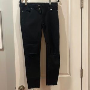 Banana Republic Black Skinny Jeans. Size 28. Rips by the knees.